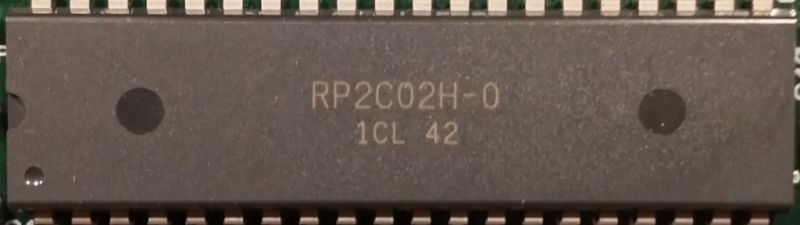 File:PPU=RP2C02H-0 1CL 42 (laser).jpg
